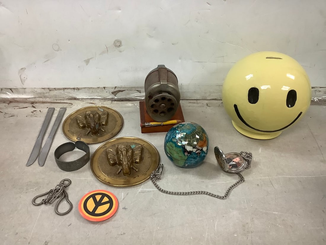 Lot of ceramic smiley bank(6in.tall),vintage pencil sharpener, brass elephant decor, and more (1 of 1)