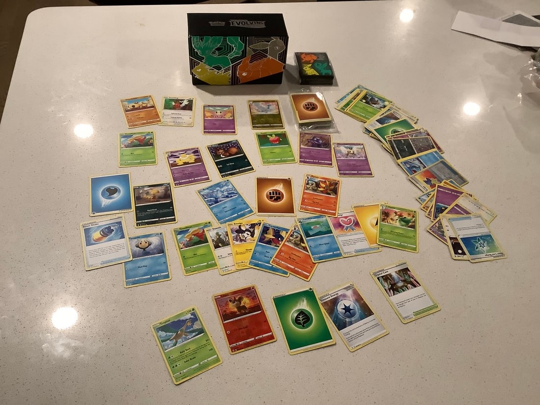 Big lot of pokemon cards from Evolving skies, wrapped energy stack, empty ETB box and full set of (1 of 1)