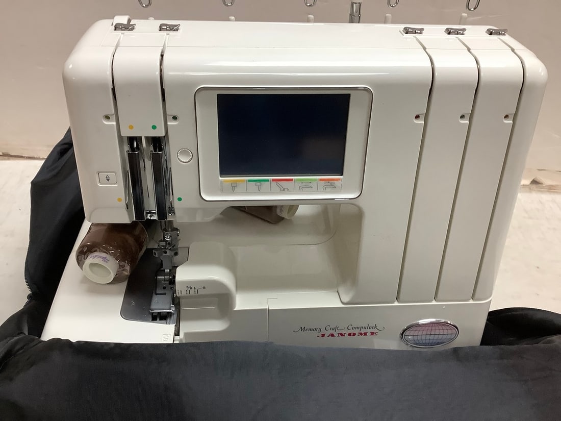 Janome Sewing Machine and Yarn With Floral Zip-Up Case: Janome Sewing Machine and Yarn With Floral Zip-Up Case