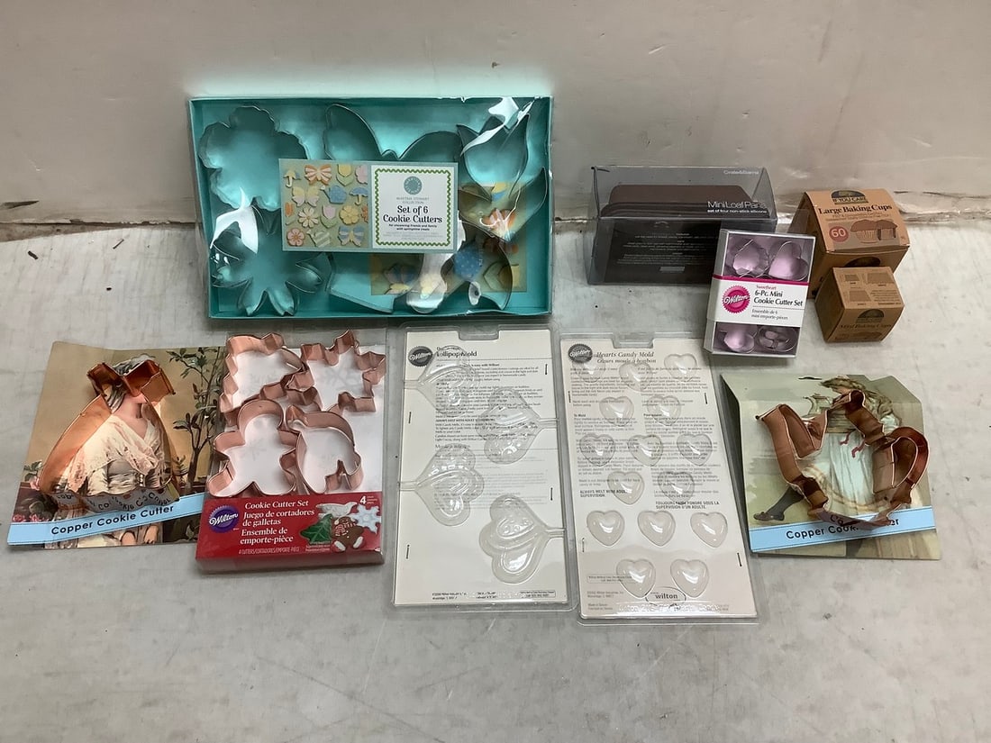 Lot of Crate & Barrel Mini Loaf Pans, Wilton lollipop mold, various cookie cutters, and baking cups (1 of 1)