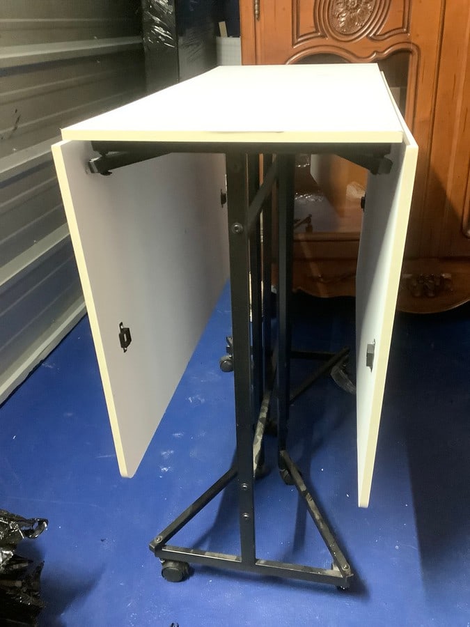 Wheel tilt top crafting table(60in.x36in.): Wheel tilt top crafting table(60in.x36in.)