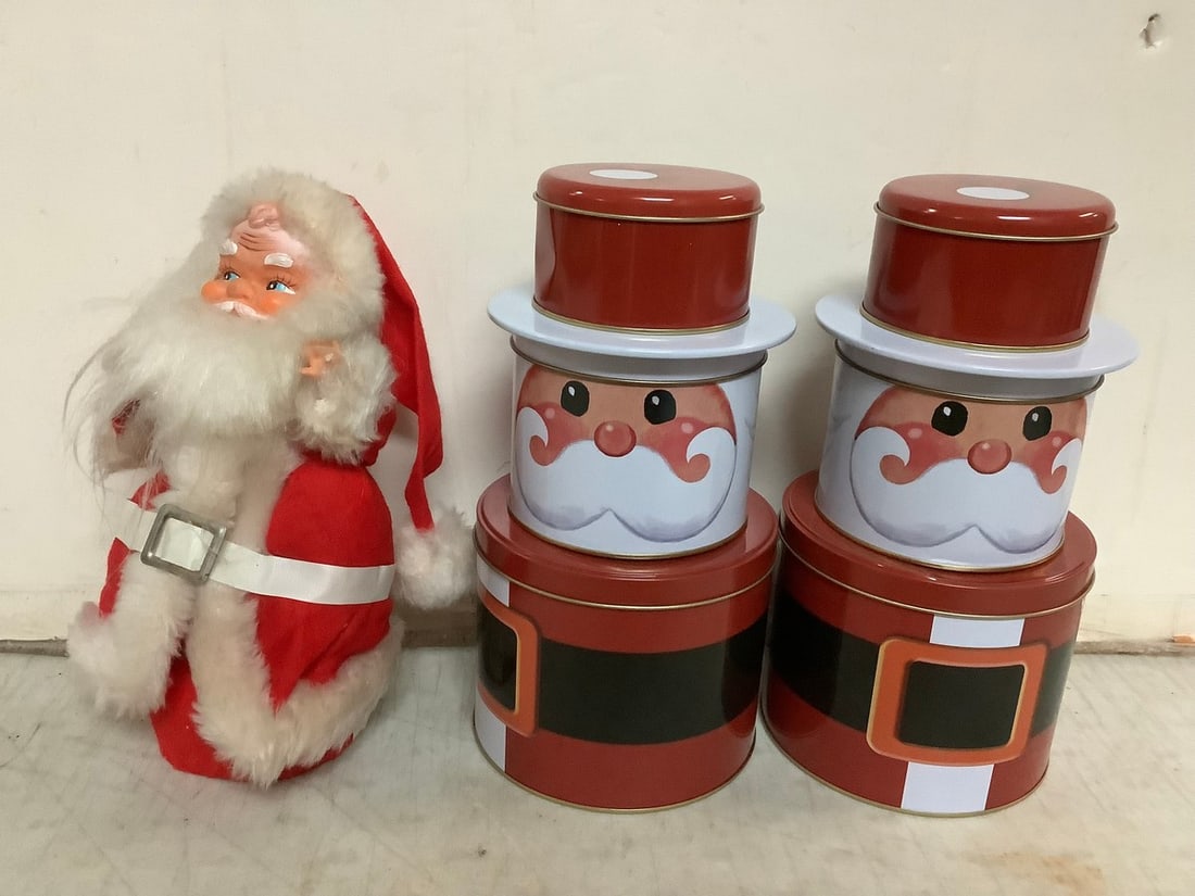 Lot of decorative santa Christmas tins and statue(tallest 10.25in.): Lot of decorative santa Christmas tins and statue(tallest 10.25in.)