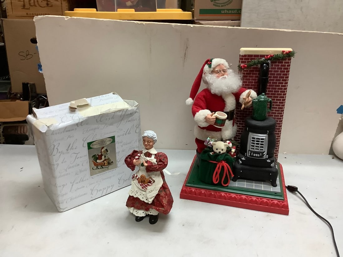 Santa by pot belly stove 17.5x12.5, possible dreams santa figure and misses clause figure (1 of 1)
