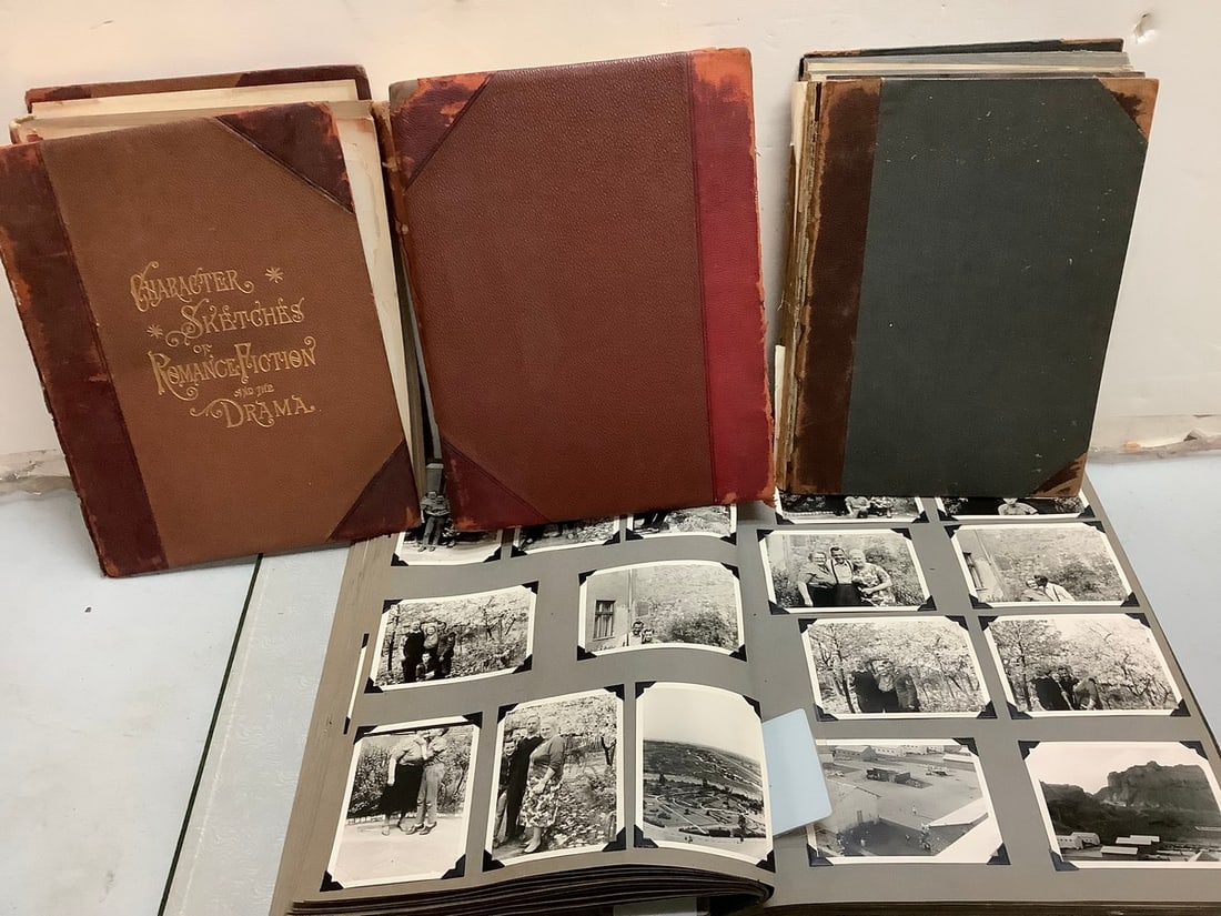 Lot of vintage scrapbook filled with black and white photographs and other vintage books (1 of 1)