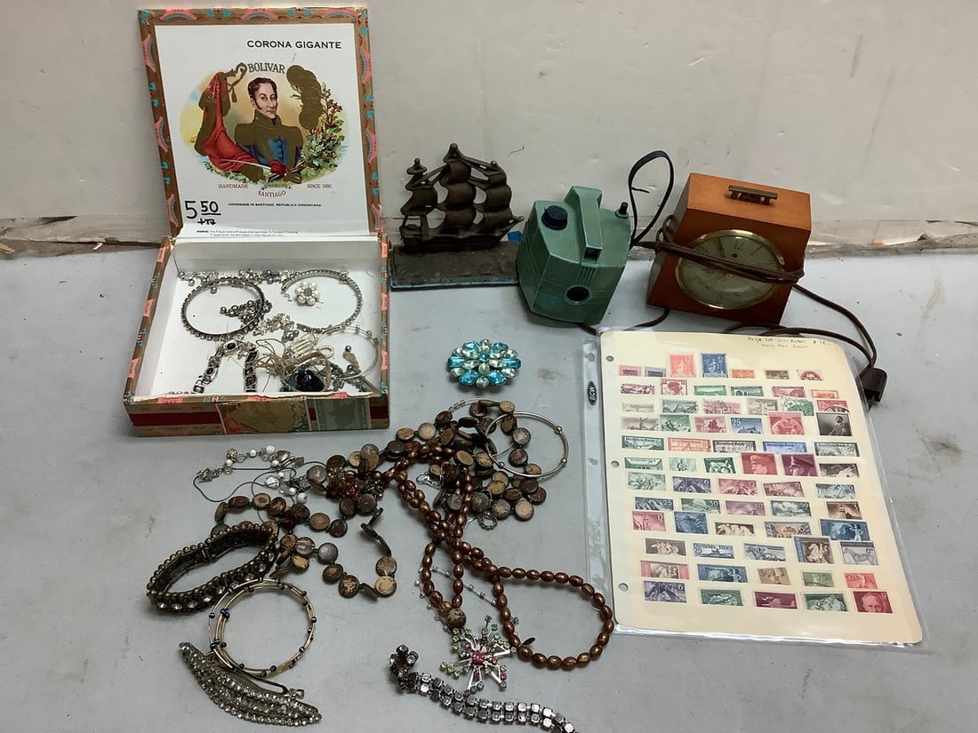 Lot of vintage stamps, Seth Thomas clock, costume jewelry, and more(tallest 6in.) (1 of 1)