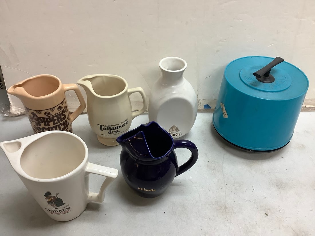 Lot of vintage tote 45 record holder and decorative water whiskey pitchers(tallest 8.25in.) (1 of 1)