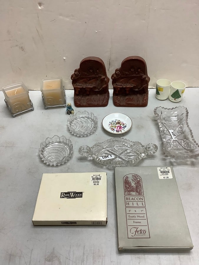 Lot of wooden bookends(6.5in.tall), candles in stands, frames, and various glass bowls (1 of 1)