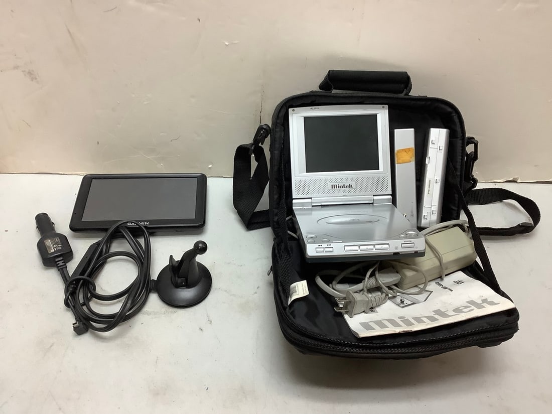 Lot of Garmin GPS with plug and Mintek DVD player with plug (1 of 1)