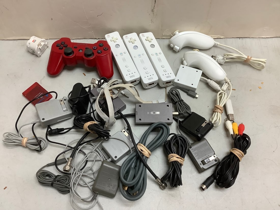 Lot of gaming accessories(Wii remotes, playstation 2 controller, and more) (1 of 1)