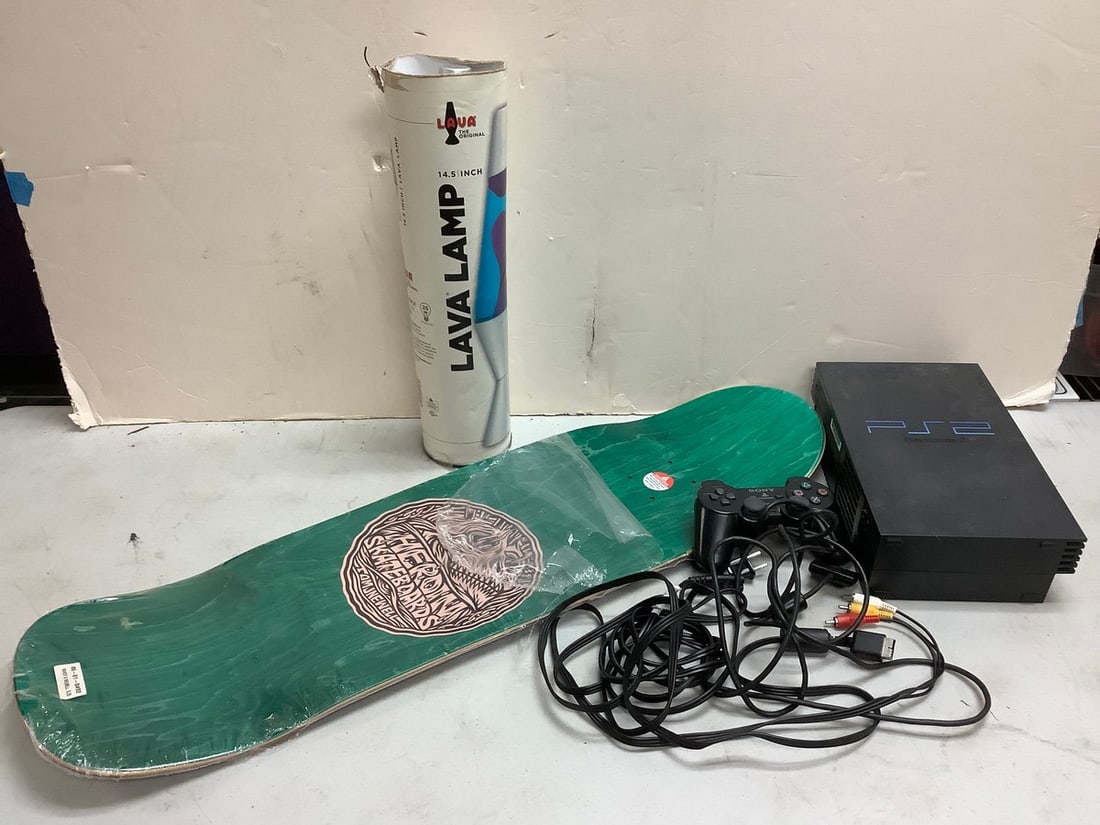 Lot of Playstation 2 with controller, Lava lamp, and Tom JNewell heroin skateboards (board (1 of 1)