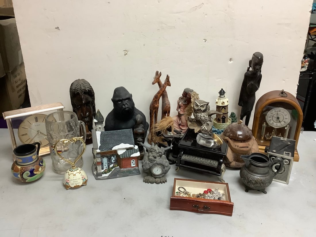 Lot of Linden encased clock, African Heritage statue, Silver plate Wil Cox pitcher, and more(tallest (1 of 1)