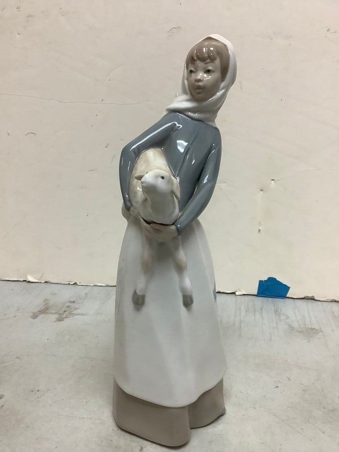 Lladro ceramic woman holding goat(10.25in.tall): Lladro ceramic woman holding goat(10.25in.tall)