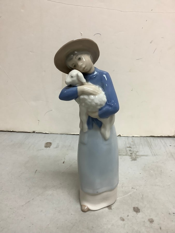 Lladro ceramic woman holding goat(7.5in.tall): Lladro ceramic woman holding goat(7.5in.tall)