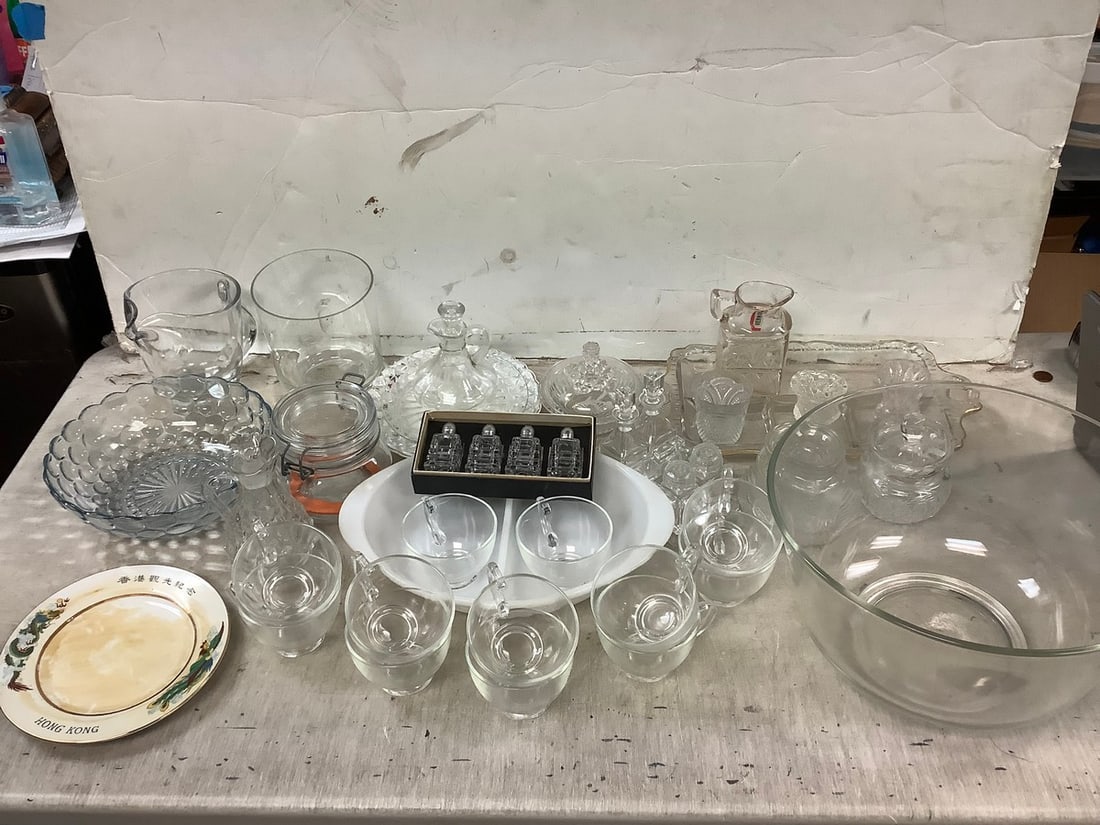 Glass cups, decanters, glass bowl(6.75in.tall 11.5in.long), candleholders, and more