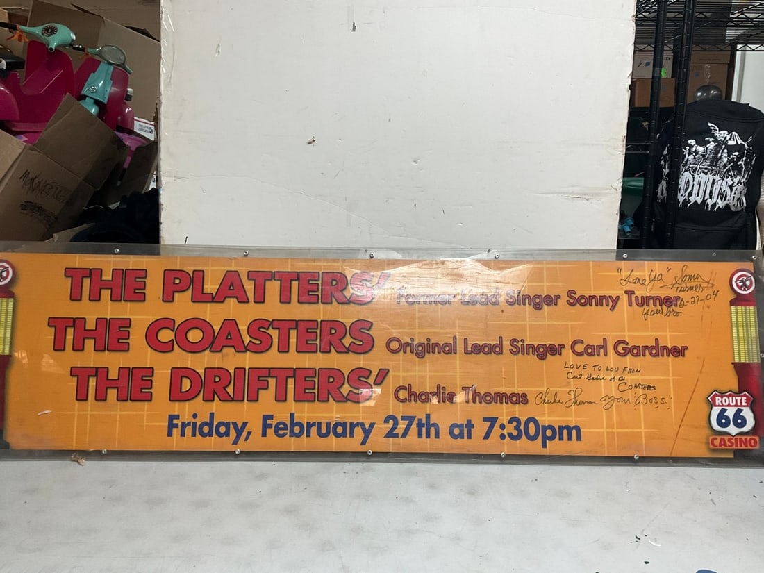 Wall décor signed by the complete band of platters(74in.x20in.) (1 of 1)