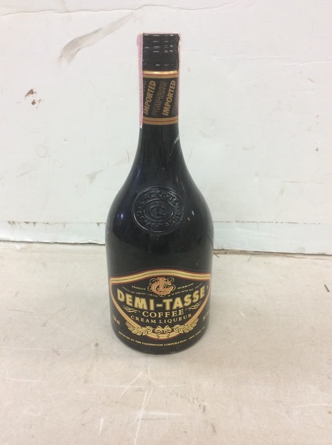 Lacoste Demi-Tasse Coffee Cream Liquor: Any contents in bottle is Free; You are bidding on the bottle & unbroken tax stamp