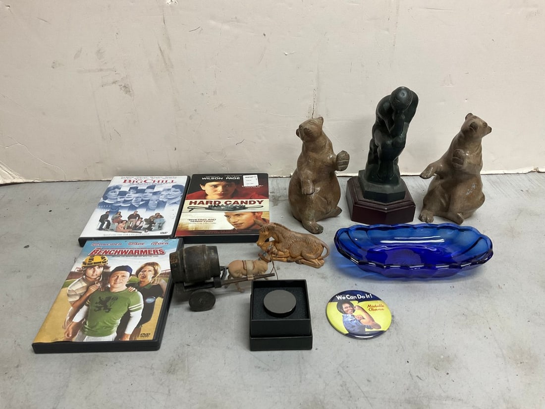DVD’s, decorative statues, and more(tallest 8.5in.): DVD’s, decorative statues, and more(tallest 8.5in.)