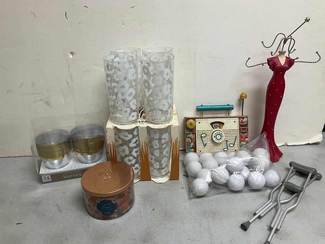 Plastic tumblers, golf balls, vintage Fisher Price toy, and more(15.5in.tallest) (1 of 1)