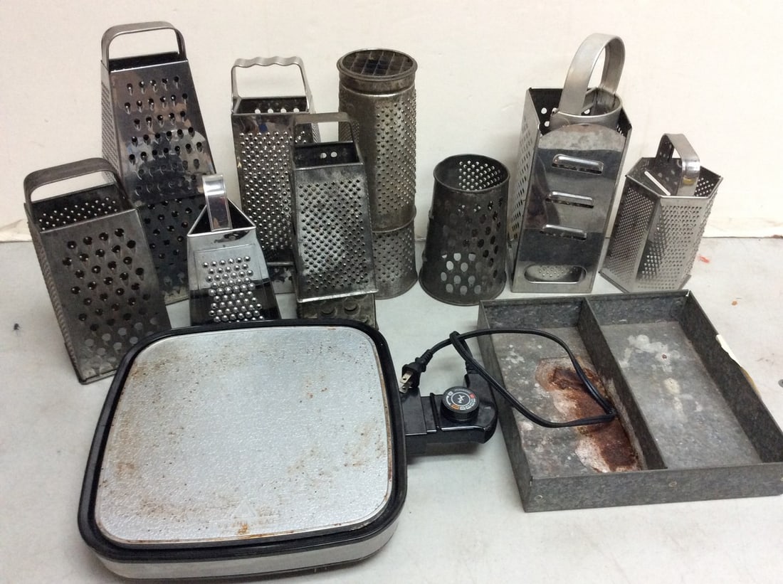 Lot of cheese graters, Intertek skillet, and more(12in.tallest): Lot of cheese graters, Intertek skillet, and more(12in.tallest)