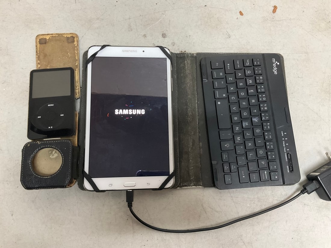 Samsung tablet(working condition) with magnetic Medge keyboard and iPod (1 of 1)