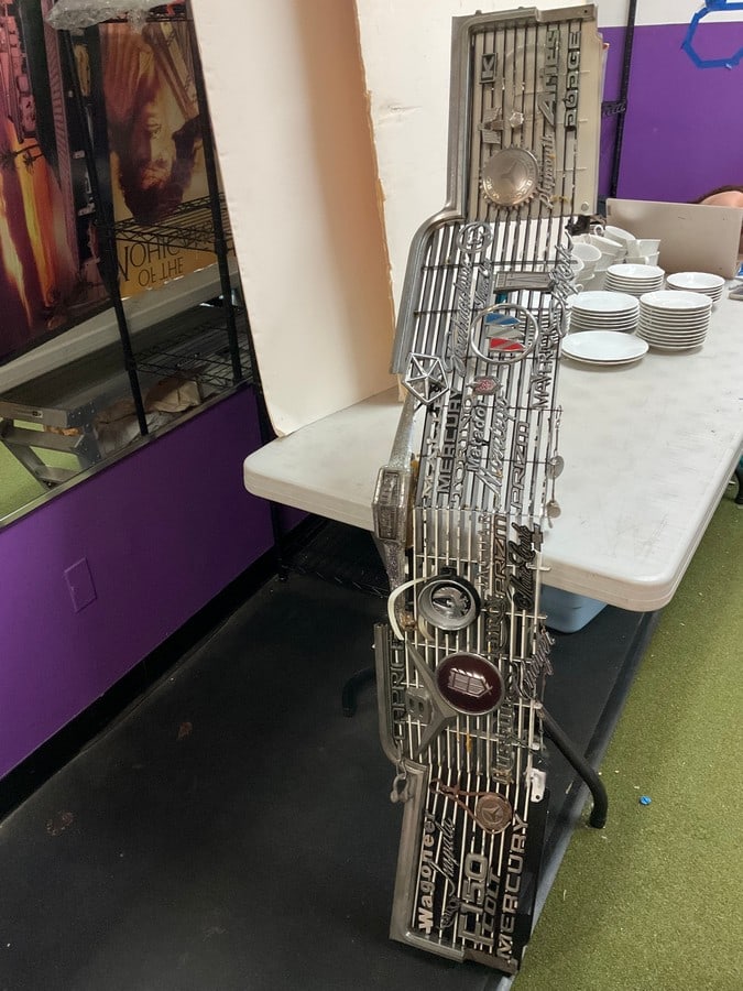 Vintage Chevy front grill with vintage car emblems (1 of 1)