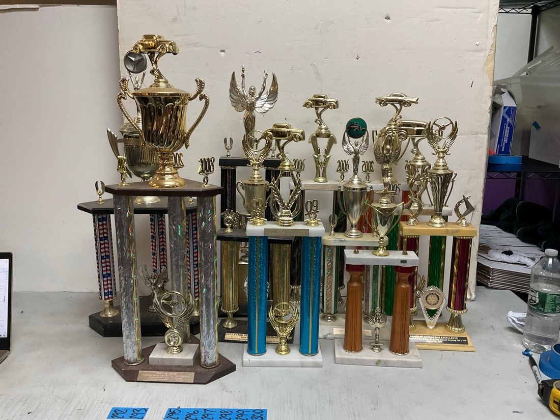 Various car show trophies(tallest about 29.5in.): Various car show trophies(tallest about 29.5in.)