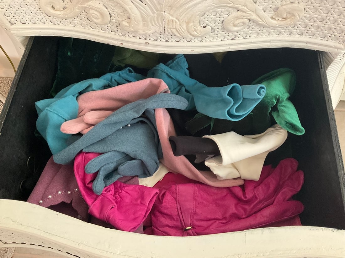 Drawer full of vintage leather and cloth gloves: Drawer full of vintage leather and cloth gloves