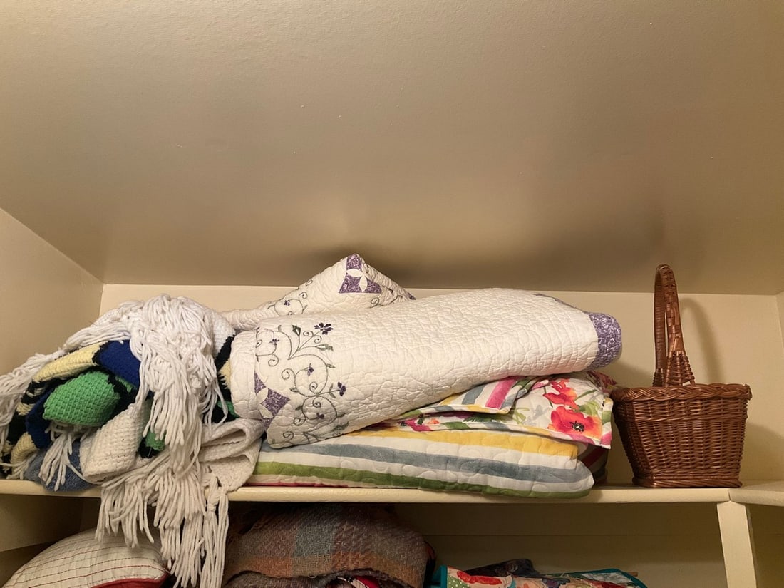 Various quilts/blankets and wicker basket(16in.tall) (1 of 1)