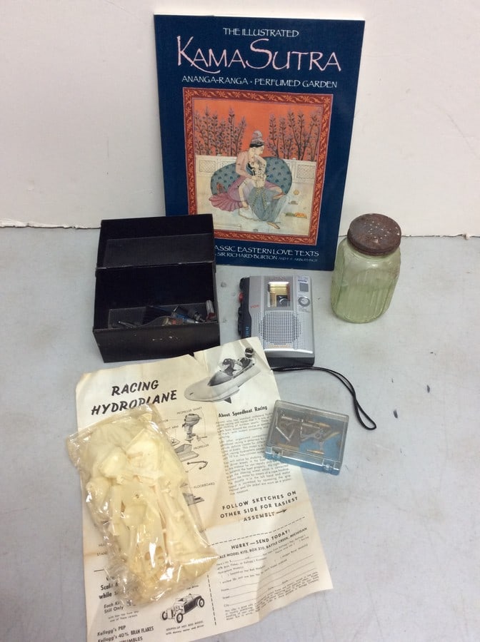 Kama Sutra book, Sony cassette-corder device, glass salt shaker(5in.tall), and more (1 of 1)