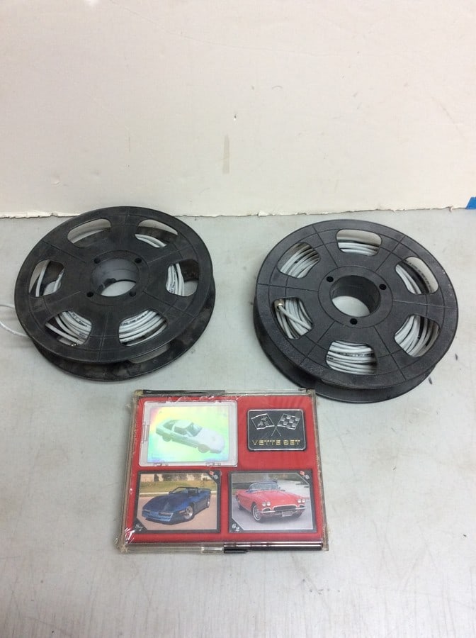 Corvette collector cards and rolls of wire (1 of 1)