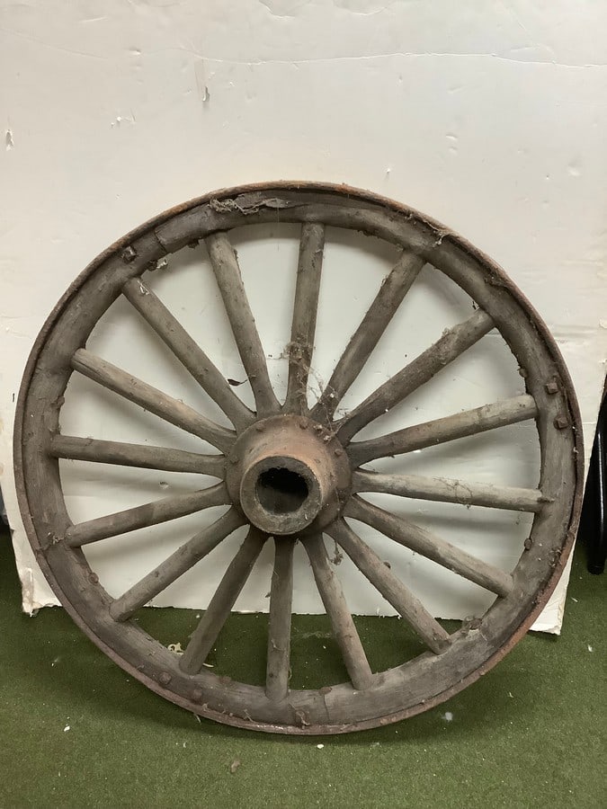 Vintage wooden wagon wheel(36.25in.across): Vintage wooden wagon wheel(36.25in.across)