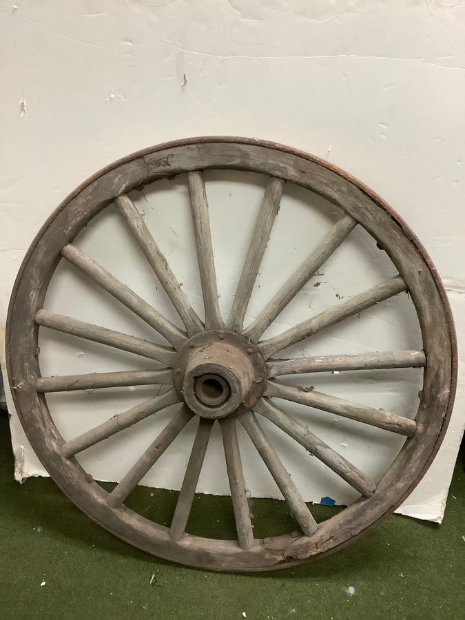 Vintage wooden wagon wheel(36.25in.across): Vintage wooden wagon wheel(36.25in.across)
