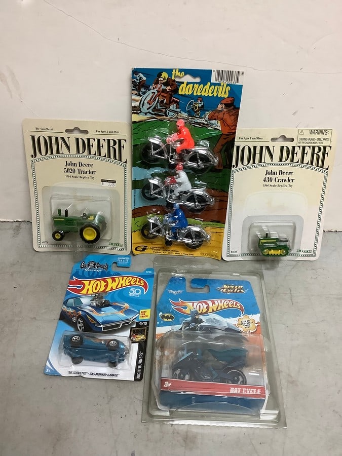 Hot Wheels collectibles, John Deere tractor/crawler model, and The Daredevils model (1 of 1)