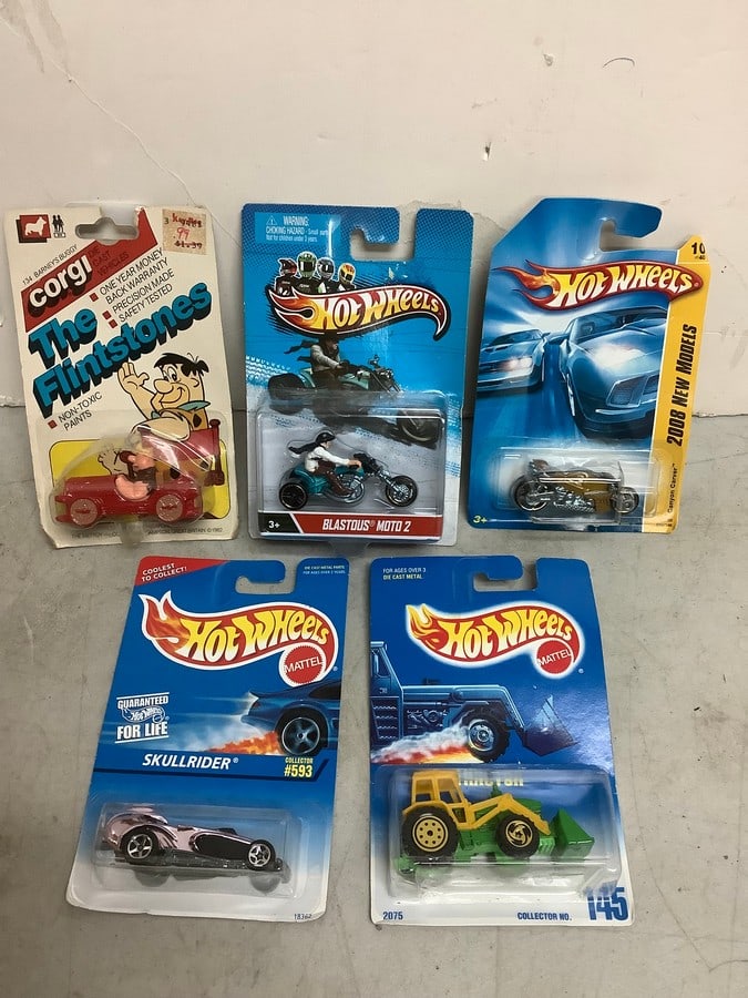 Hot Wheels die cast cars and The Flinstones Barney's Buggy collectible: Hot Wheels die cast cars and The Flinstones Barney's Buggy collectible