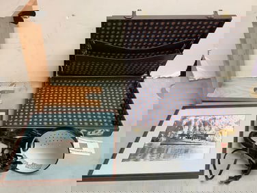 Framed boat artwork(13.75in.x12.5in.), briefcase, clip on desk lamp, and more