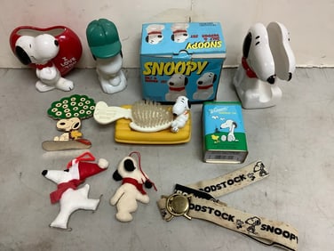 Vintage Snoopy collectibles(napkin holder-6in.tall, salt & pepper shaker set, 1997 surprise tin, and