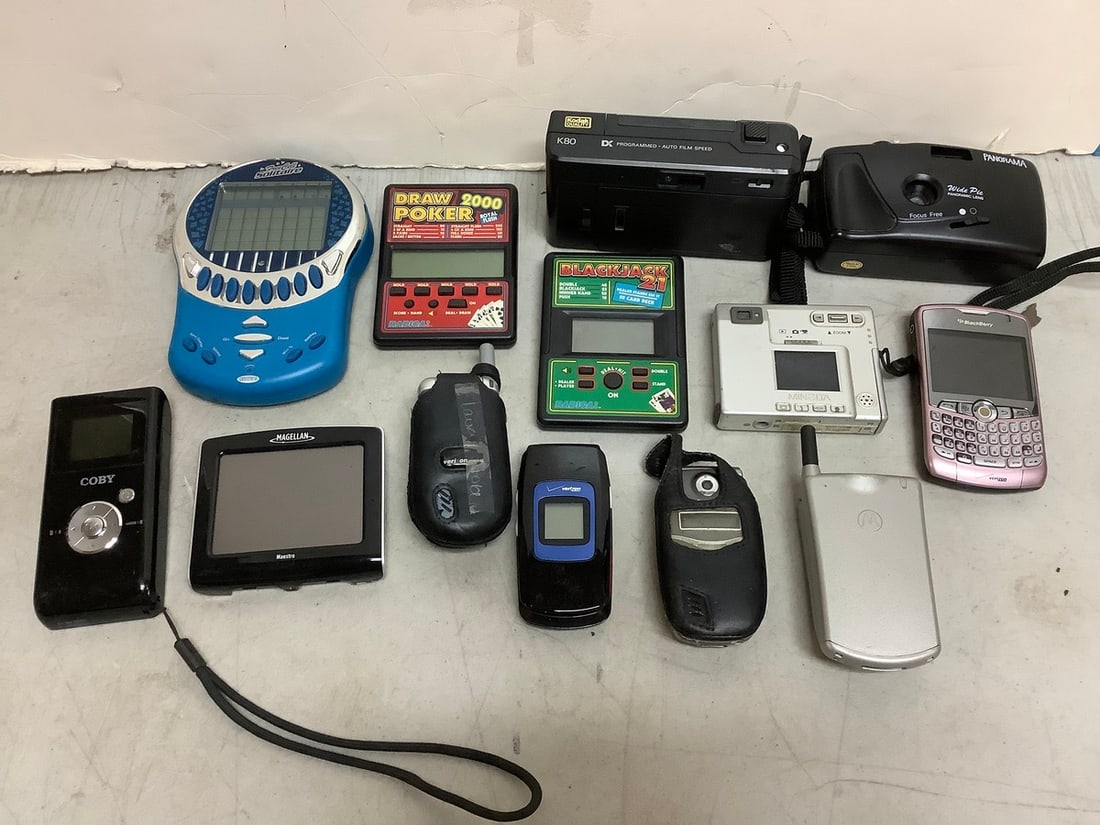 Vintage cameras(Kodak, Panorama), flip phones, handheld games, and more (1 of 1)