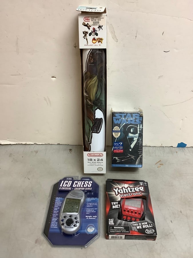 Star Wars trilogy, Yahtzee electronic game, LCD chess/checkers, and Nintendo character wall (1 of 1)