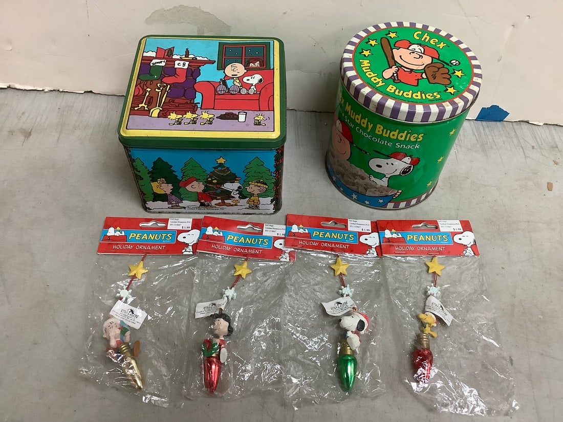 Peanuts holiday ornaments and tin containers(5.75in.tallest): Peanuts holiday ornaments and tin containers(5.75in.tallest)