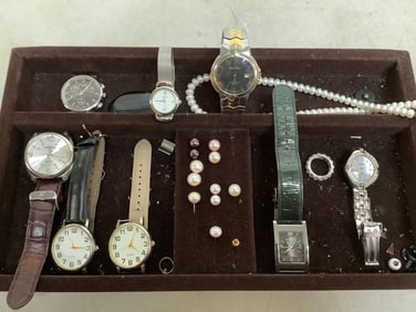 Various watches in organizer(14in.x8in.x1.25in.)