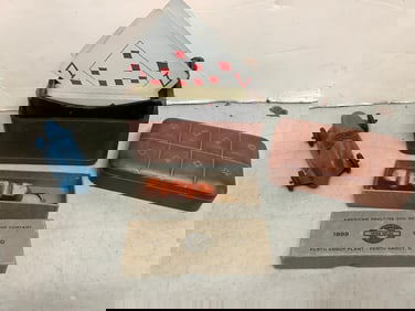 Playing cards, American Smelting and Refining Company cigarette holder, and more