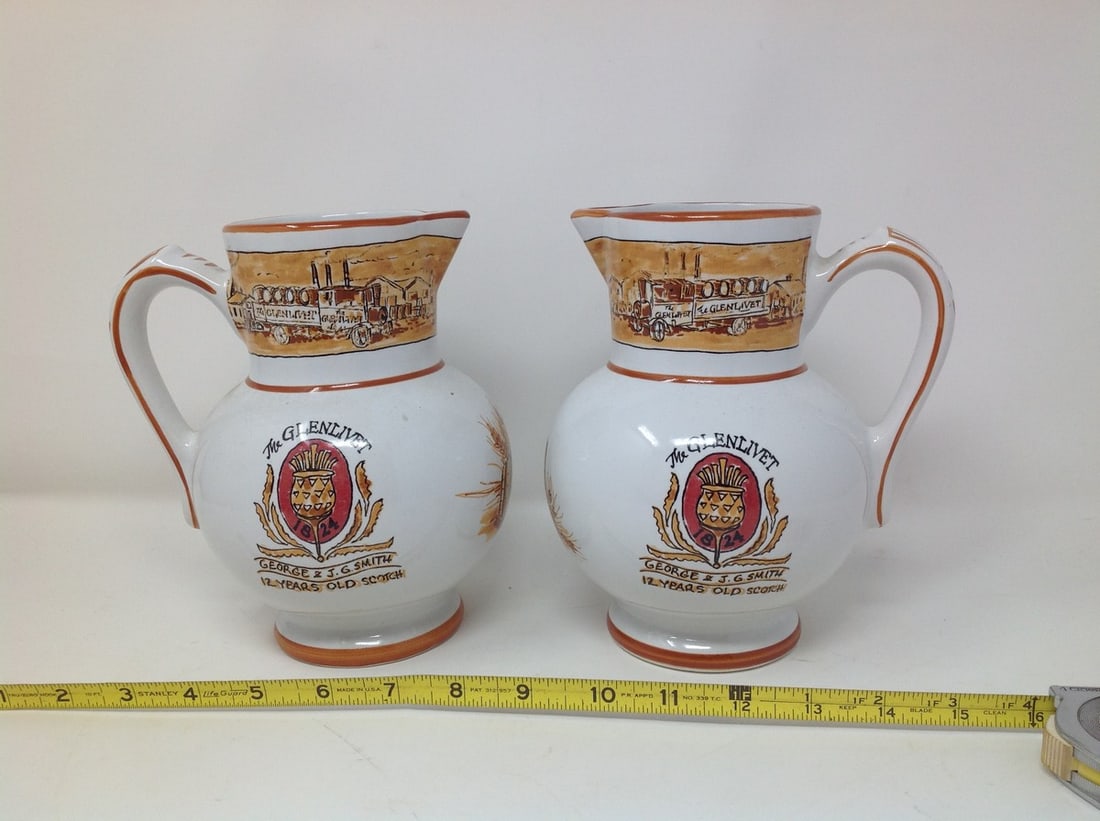 Lot of 2 The glenlivent george/ j.g. smith, 12 years old scotch pitchers, revol france 7.50: Lot of 2 The glenlivent george/ j.g. smith, 12 years old scotch pitchers, revol france 7.50”