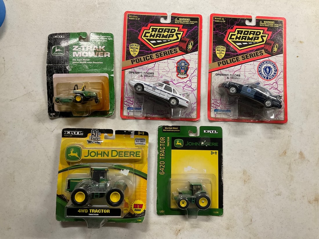 lot of john deere and road champs cars new in the package: lot of john deere and road champs cars new in the package