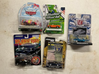 lot of disney's cars and other cars new in the package