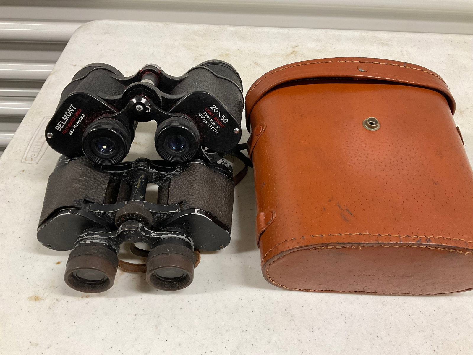 vintage belmount 20x50 and other 8x34 binculars with case: vintage belmount 20x50 and other 8x34 binculars with case