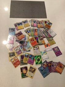 HUGE lot of pokemon cards english and japanese in empty celebrations etb