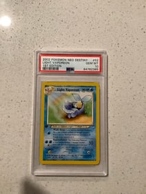 PSA 10 2002 1st editon pokemon neo destiny light vaporeon