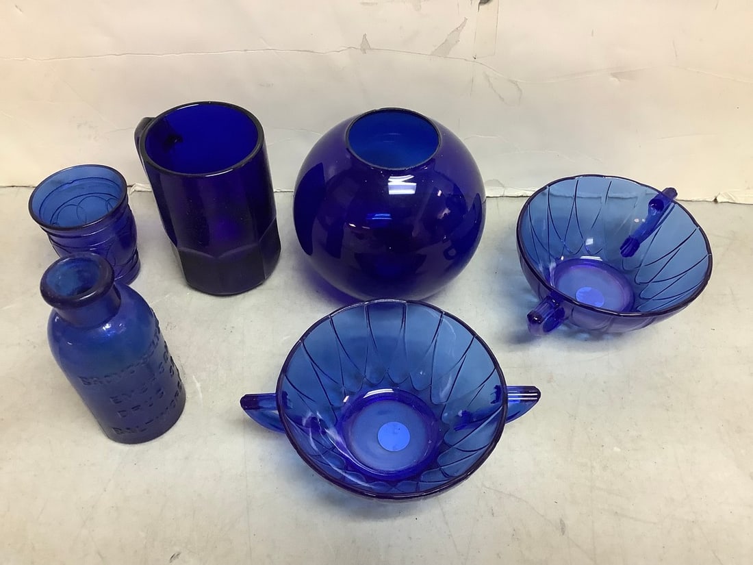 Cobalt blue glass cups and more(tallest 5in.): Cobalt blue glass cups and more(tallest 5in.)