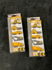 Lot of 2: Maisto Volvo 5 pack construction trucks