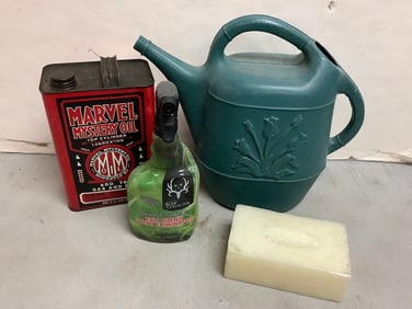 Watering can, Silver Shield rall blend scent eliminator, Marvel Mystery oil, and more